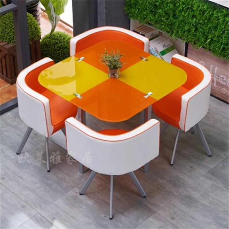 Mesa y sillas de comedor modernas, mesa redonda pequeña de vidrio templado, mesa y sillas para recepción y negociación, una mesa y cuatro sillas, cocina de inducción.