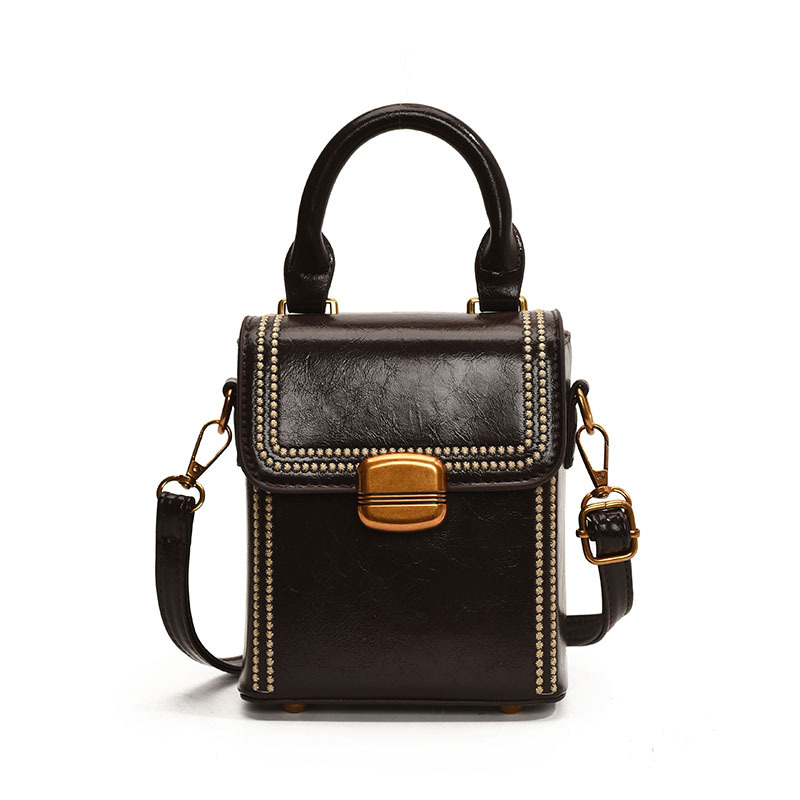 Bolso de moda retro mujer 2025 primavera nuevo bolso ocio retro bolso de nicho popular trampolín de viaje de moda