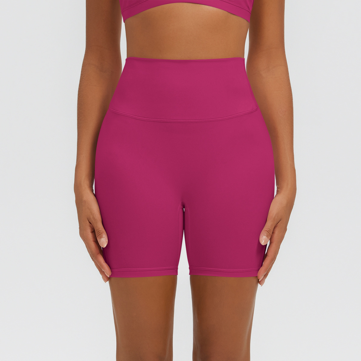 Nuevo tipo delgado de hielo, piel transpirable, ajustado, color sólido, ropa de yoga, pantalones cortos de tres puntos.