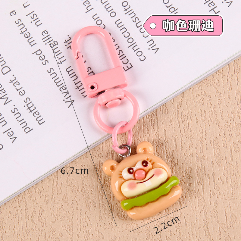 Nuevo estilo de dibujos animados estudiantes llaveros lindos colgantes de resina accesorios bolsos escolares amigos regalos llaveros al por mayor