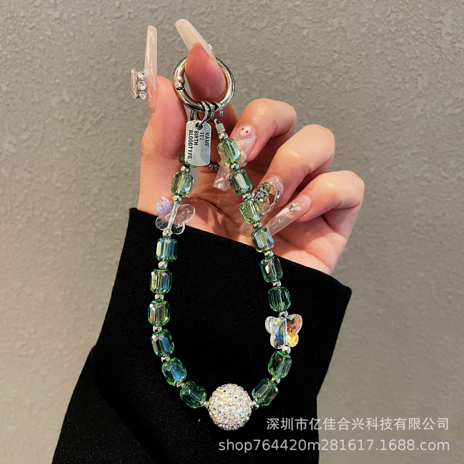 Japón y Corea del Sur estilo transfronterizo nuevo caso de teléfono móvil colgante cadena de cristal string arco de diamante cadena de teléfono móvil colgante de muñeca