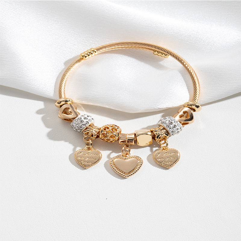 Panjia pulsera Dora DIY cuentas transfronterizas explosión de aleación en forma de corazón tallado colgante de letras de acero inoxidable brazalete de bola de perforación