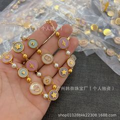 迪家のCDのネックレスの女性の25年の早春の新型のD-LUCKのカラー樹脂のハチのピンクの円形の鎖のチェーンのブレスレット