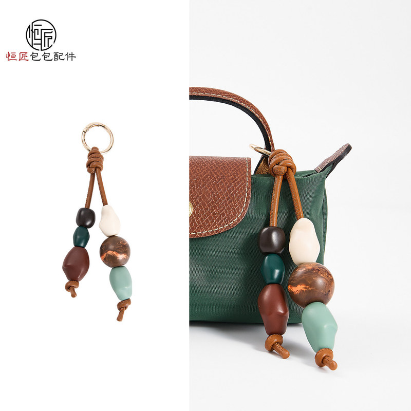 Wholesale ready-to-ship items suitable for Longchamp Xtra ceramic bead charms and new Longchamp bag stone pendants Wholesale ready-to-ship items suitable for Longchamp Xtra ceramic bead charms and new Longchamp bag stone pendants