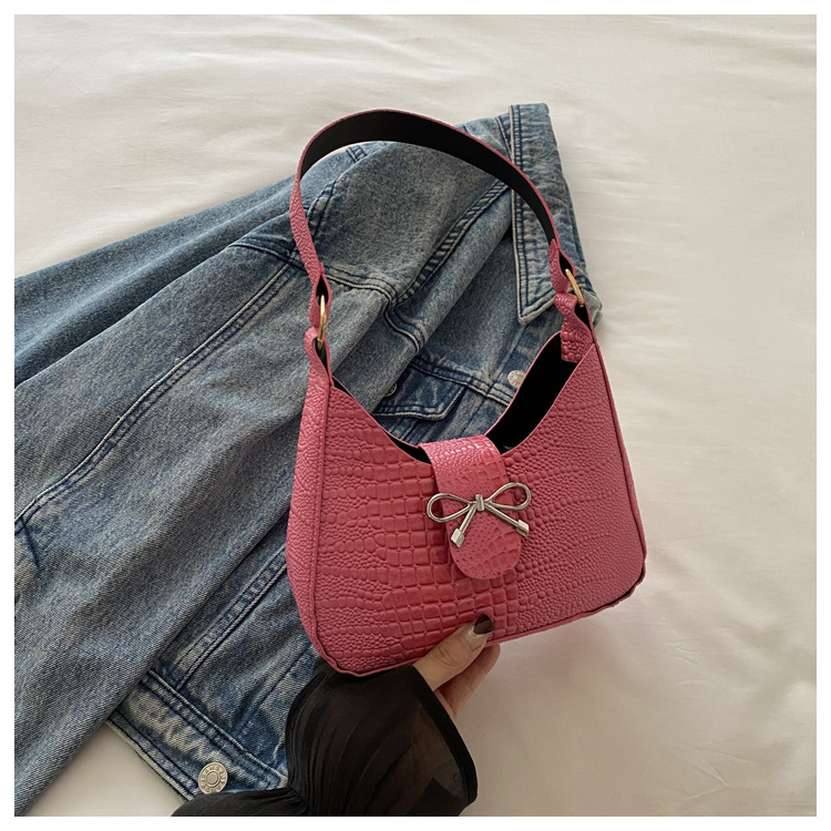 Bolso de mano con lazo de sentido de alta gama para mujer 2024 nuevo bolso de mensajero de cadena de primavera mini bolso de axila de un solo hombro