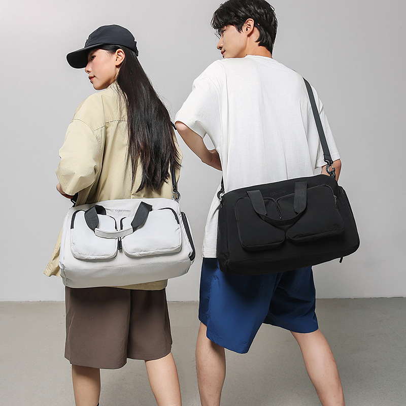 Bolsa deportiva de acondicionamiento físico de gran capacidad para mujeres bolsas de viaje corto bolsas de mano 2025 nuevas bolsas domésticas almacenables