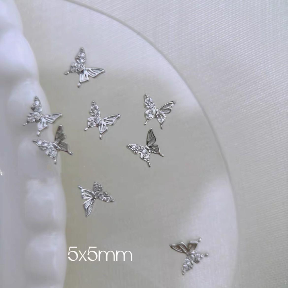 Celebridad de Internet nuevos accesorios de uñas Iris arco de alta retención de color ajuste arco de uñas diamante desgaste material de uñas diamante