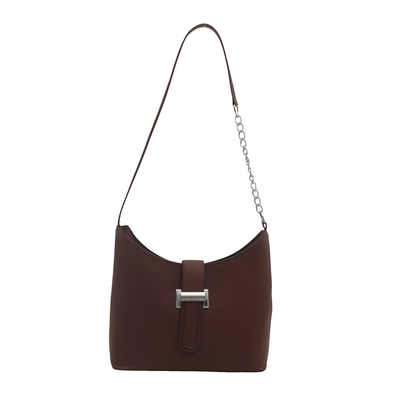 Bolsa de hombro de color sólido extranjero de otoño nicho de moda bolsa de brazo para mujeres 2024 nueva moda temperamento retro bolso de mochila