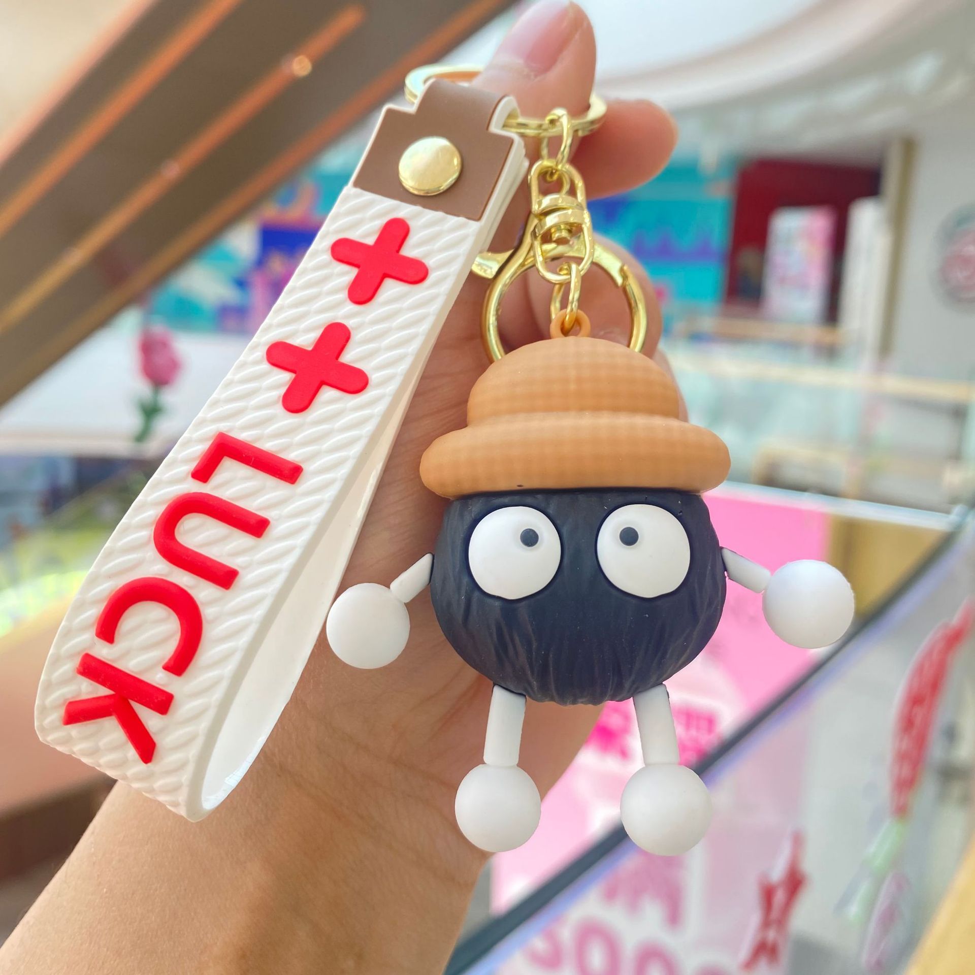 Qianhe Qianxun llavero de dibujos animados mochila colgante lindo pequeñas briquetas muñeca máquina coche regalo al por mayor