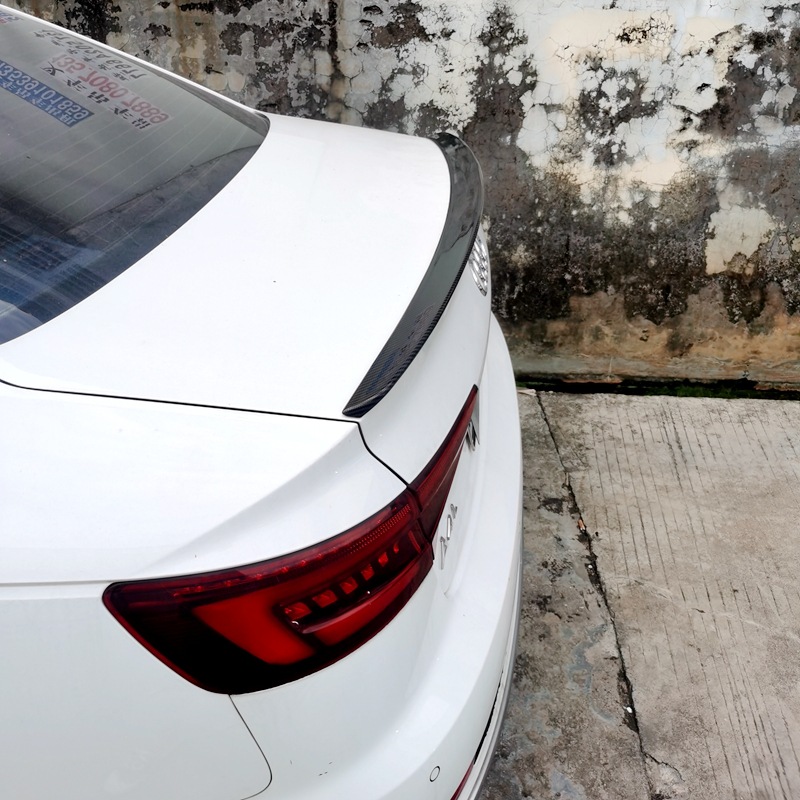 Suitable for Audi A4L, this S4-style small rear spoiler is a paint-applied ABS rear diffuser that can be installed without drilling holes, providing a streamlined and aerodynamic look