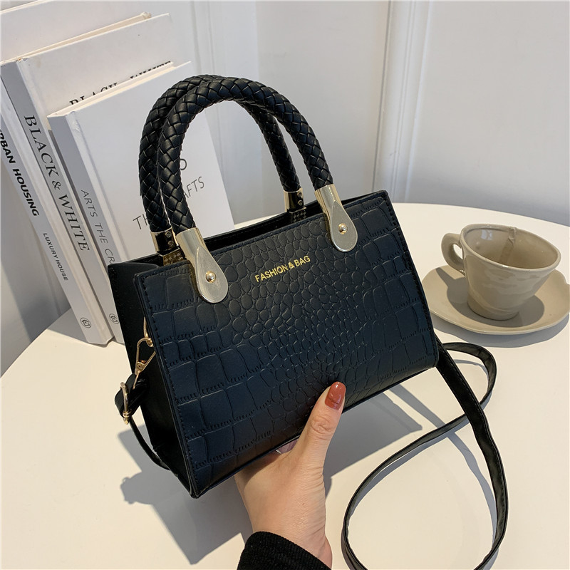 Bolsa de moda con textura para mujer 2024 estilo coreano estilo occidental nuevo color caramelo patrón de piedra bolso tejido bolsa de mensajero