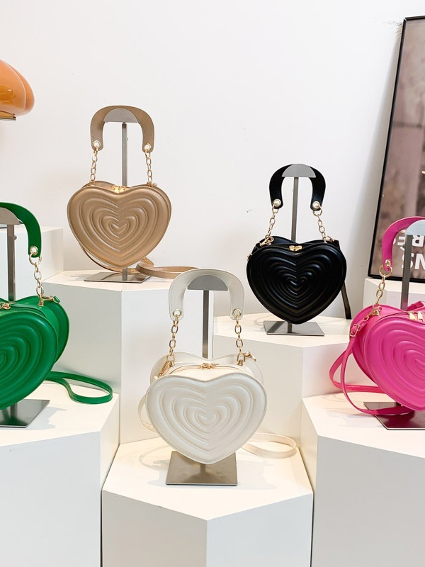 Coreano simple estilo extranjero bolso de color sólido para mujeres 2024 verano nuevo mochila de hombro textura amor bolso de mujer