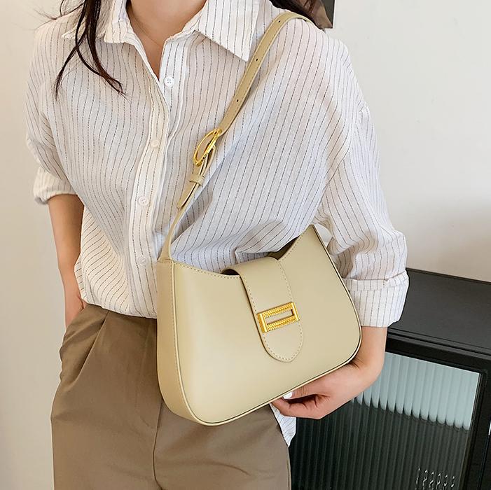 Bolso de axila súper fuego de verano para mujer 2025 nueva moda de nicho bolso de axila de alta gama textura bolso de mensajero de todo fósforo