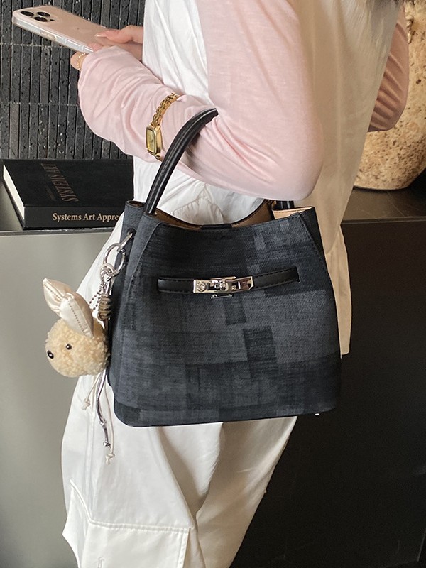 Comercio exterior transfronterizo coreano simple nicho de diseño de moda bolso de cubo para mujeres 2026 nuevo tipo de mujer mochila de hombro