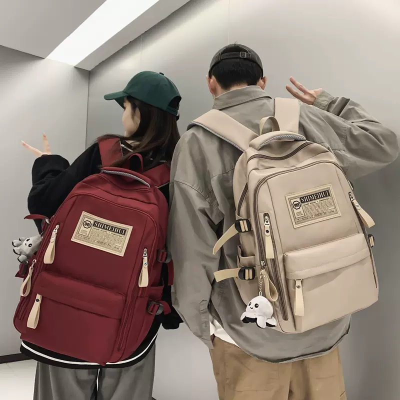 春夏简约旅行小学生双肩背包电脑休闲纯色超轻初高中生大容量书包