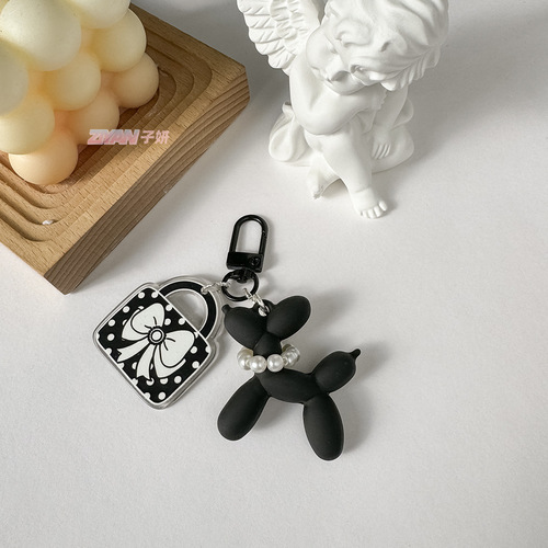 Xiaoxiangfeng fresh and sweet balloon dog ins keychain camellia pendant personalized keychain women's bag pendant