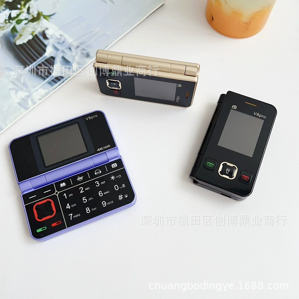 Кросс-граничная внешнеторговая модель V8pro с двумя SIM-картами, двумя экранами, креативным складным дизайном, кнопками, поддержкой нескольких языков и функцией мини-резервного телефона.