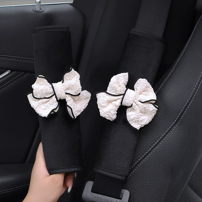 Seat belt shoulder pad | Cover for a Couple - a-pair-of-short-plush-shoulder-pads-puff-bow