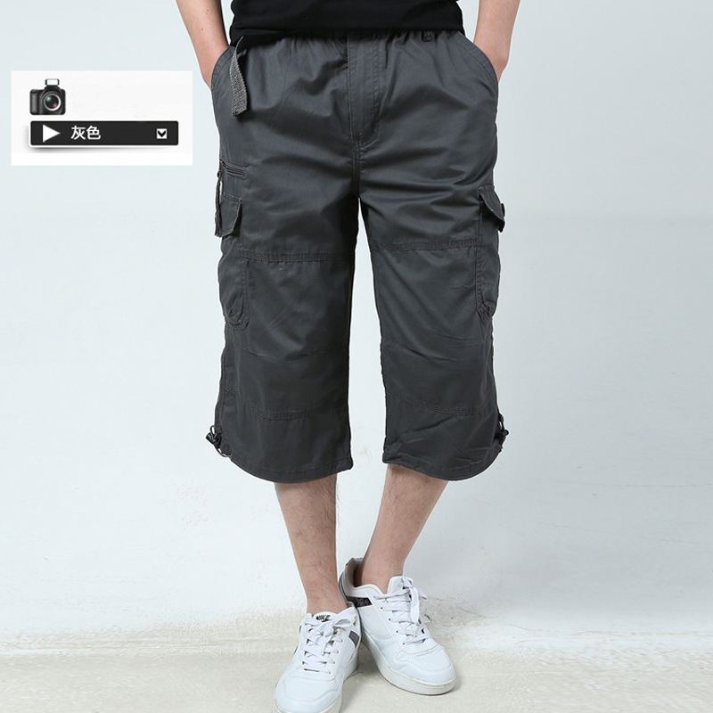 Verano ocio al aire libre ropa de trabajo para jóvenes pantalones recortados pantalones sueltos de varios bolsillos para hombres pantalones cortos deportivos de algodón estilo delgado