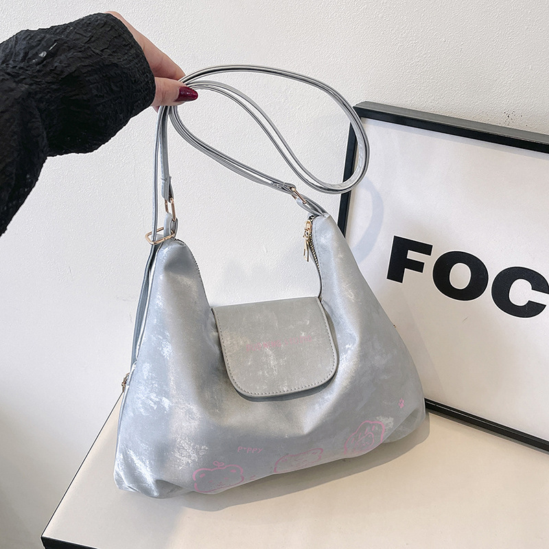 Bolso de mujer de tres usos 2025 nuevo encantador nicho de estilo extranjero mochila de hombro casual textura simple mochila de empalme