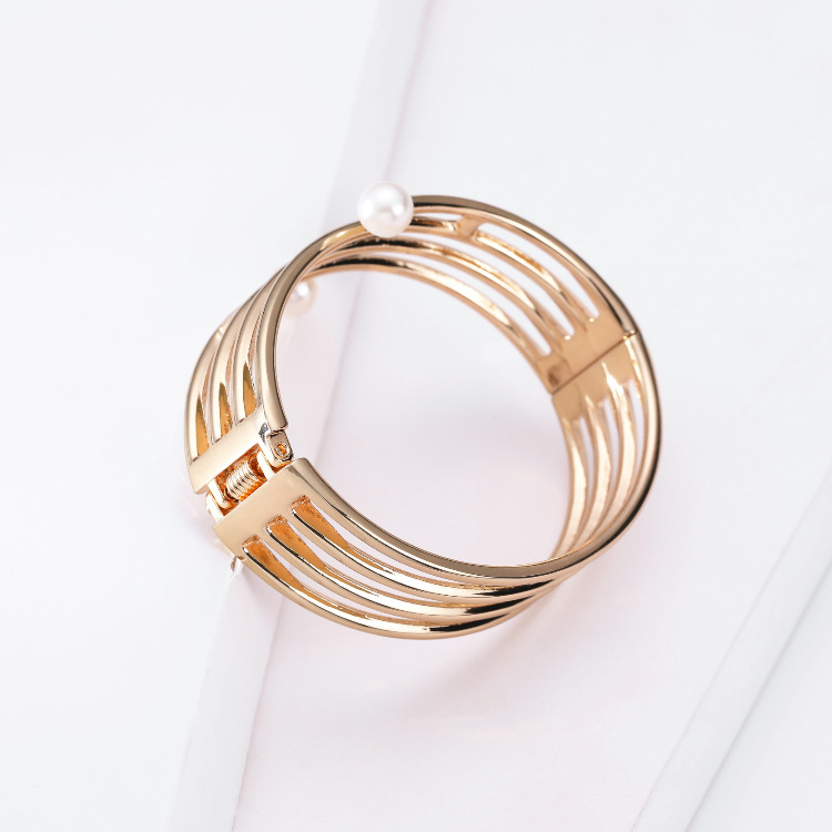 simple multi-layer hollow line-shaped double-headed pearl gold bracelet