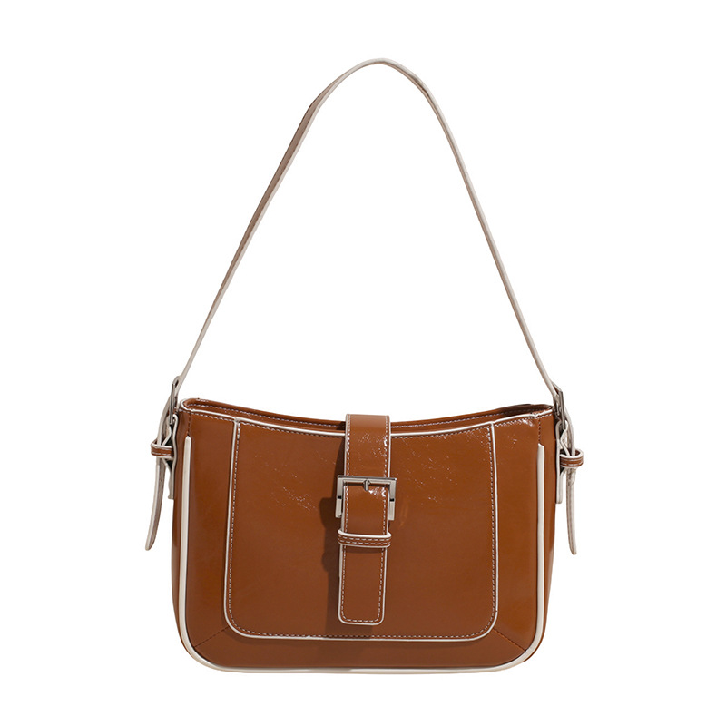 Bolso de axila retro estilo Hong Kong 2025 verano nuevo bolso femenino de alta calidad textura bolso de hombro de todo fósforo de viaje marea