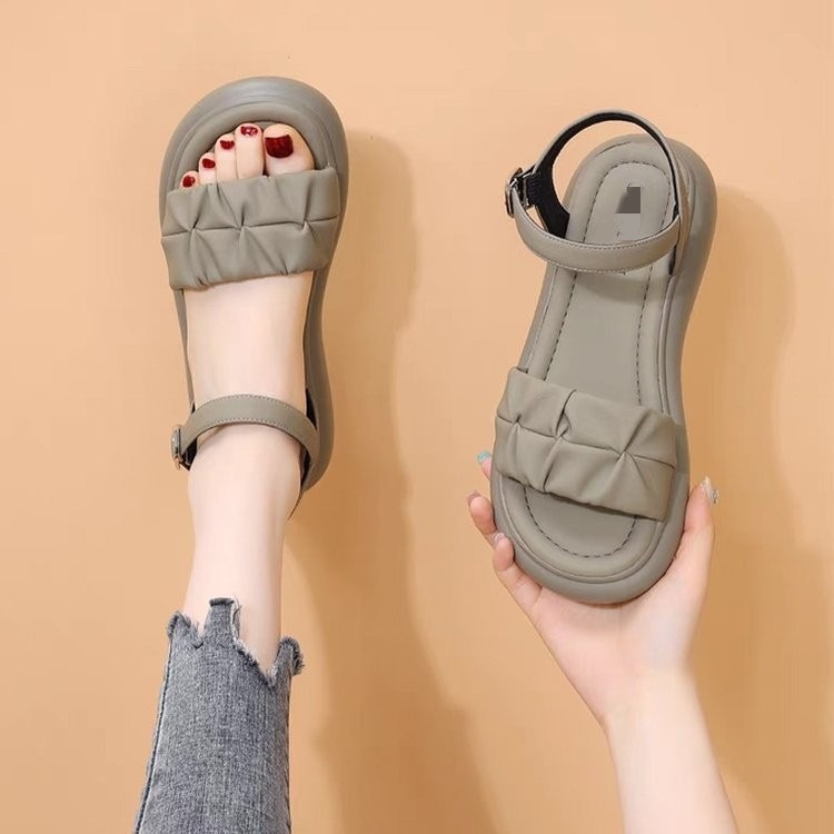 Sandalias de fondo grueso para mujeres verano 2026 nuevo estilo versátil de hadas versátil ligero con sandalias de playa vestido