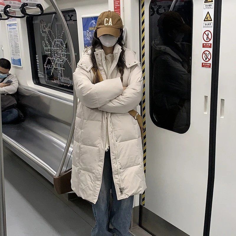 Comercio exterior ropa de algodón larga para mujeres 2025 invierno estilo coreano suelto ocio con sombrero grueso abrigo de algodón sobre la rodilla image 9