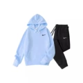 Light blue clothes + black pants, black label