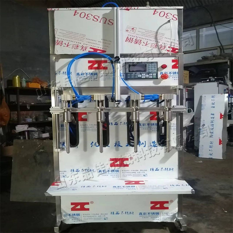 恒流计时液体封装机 自流体定量灌装机 半自动四头气动膏体装瓶机