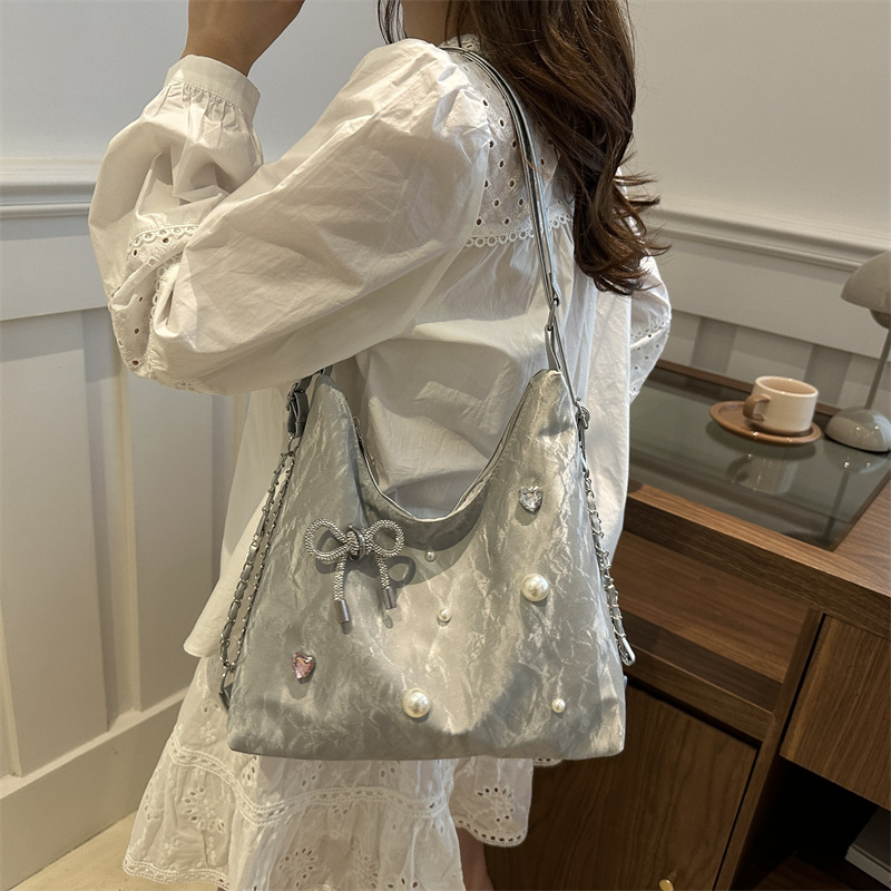 Mochila de diseño de nicho, mochila de hombro, mochila multipropósito, bolsas de cadena de alta capacidad.