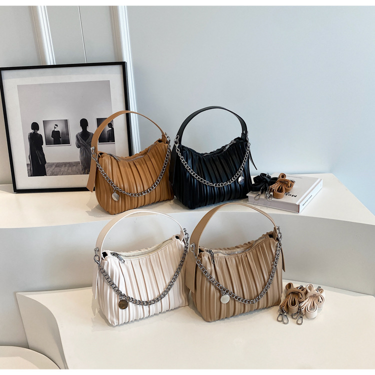 Borse di design di nicchia 2023 Borsa a mano alla moda di nuova moda Estate Senso di alto livello di pieghe borsa a secchiello a tracolla esplosiva_voghion.com