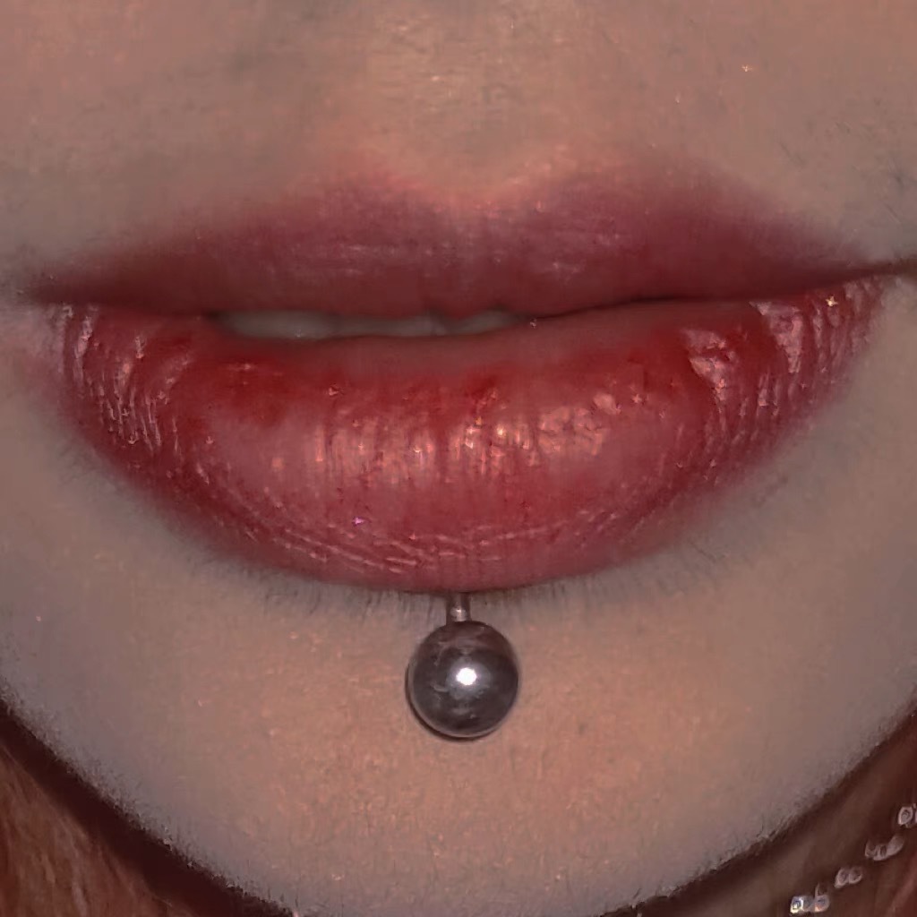Silver pointed spike labret stud material detail