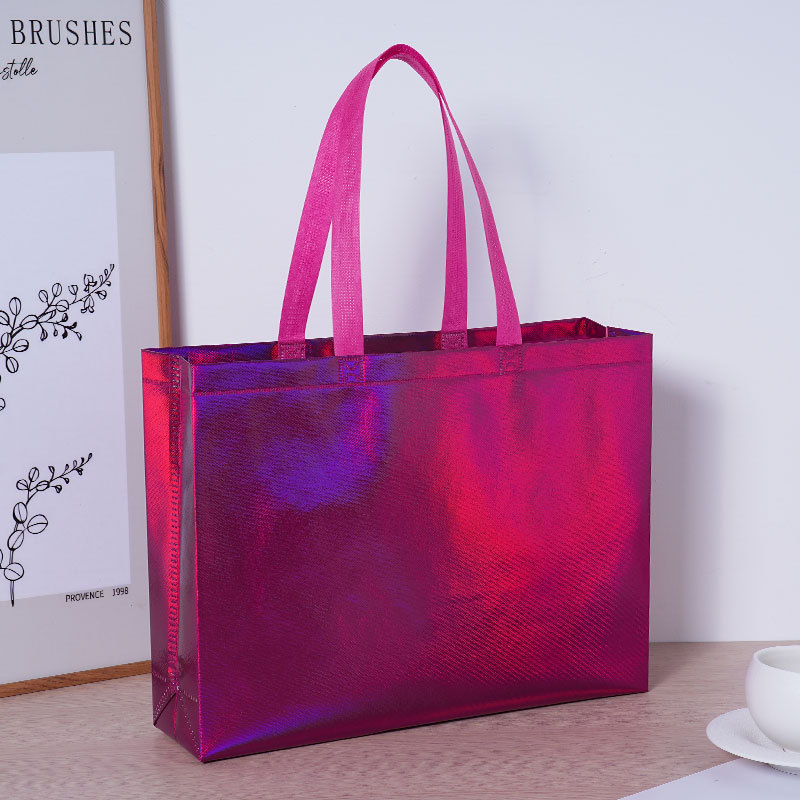 Bolsas de tela no tejida personalizadas fabricantes de alta calidad bolsas de mano no tejidas personalizadas bolsa de compras de ropa de mujer