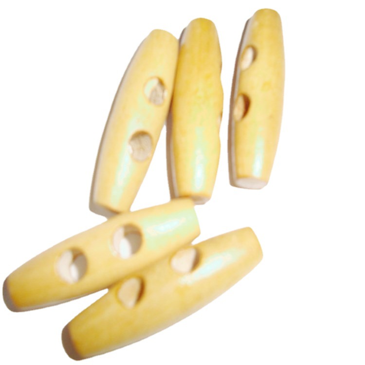 天台维娅厂家直销天然棒形木质横扣激光雕刻橄榄形 diy木制长扣子