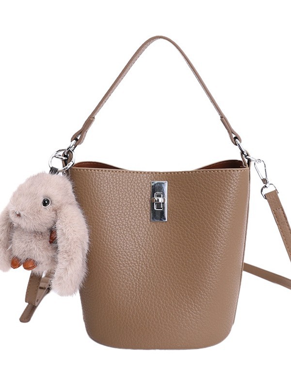 Bolso de nicho coreano portátil cubo de agua bolso para niños ventas calientes nueva textura de alta calidad lujoso ligero ocio versátil bolso de mochila