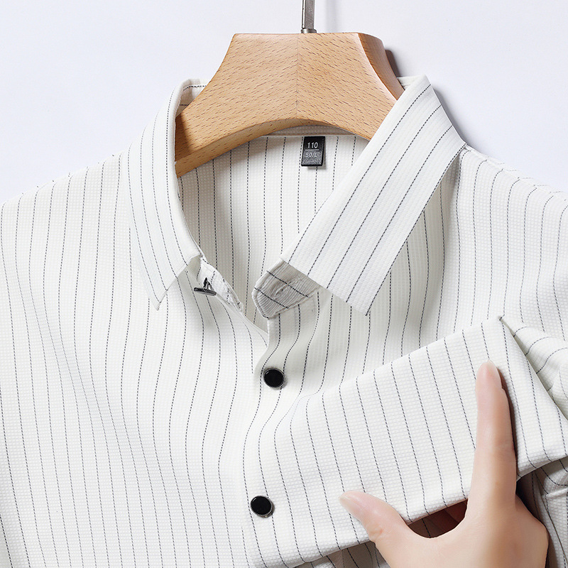Camisa sin costuras para hombres Primavera y otoño Nueva solapa a rayas camisa de manga larga de negocios jóvenes y de mediana edad sin planchar ropa superior para hombres
