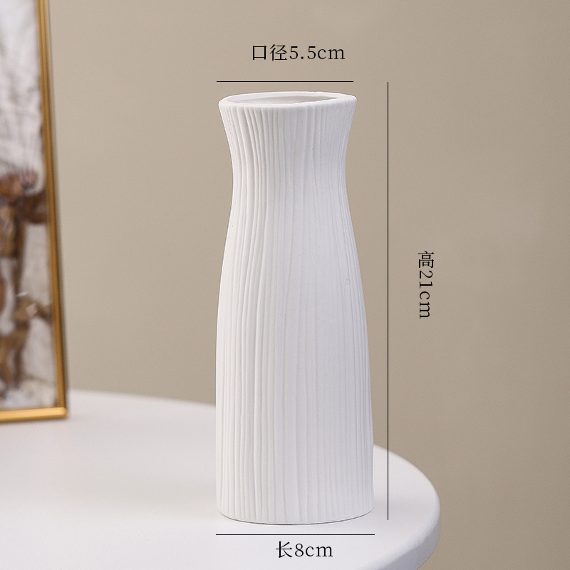 シンプルな現代の満天星陶磁器の花瓶の置物の客間の白い磁器の小さい清新な乾いた花の生け花の創意の陶磁器の花器|undefined