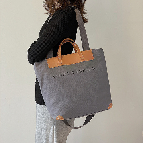 Canvas bag new style women's bag large capacity Korean style fashion shoulder crossbody bag handheld tote bag bag delivery