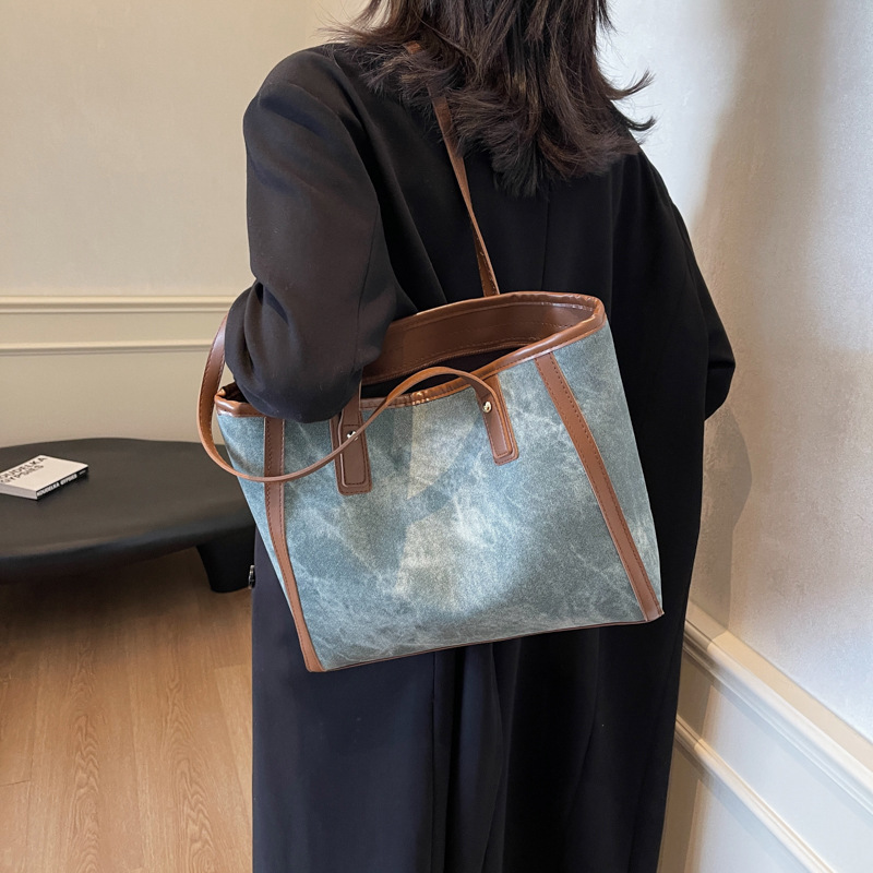 Alta sensación de bolso de mano de gran capacidad para mujeres otoño / invierno 2024 nuevo estilo retro moda tote bolso de hombro