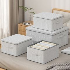 布芸を収納して折り畳み可能な大容量たんす収納ケース整理箱に服を入れる家庭用収納ケースには蓋箱がある