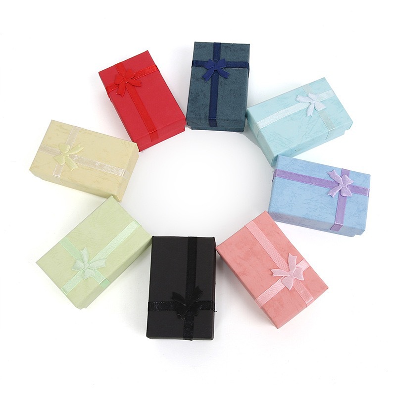 Caja de joyas de la cubierta del cielo y la tierra, serie de papeles de nube, pernos de orejas, taladro de regalo al por mayor, caja de embalaje de joyas de arco de fábrica