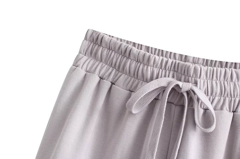 Pantalones de color sólido atado elásticos de cintura alta para mujer nihaostyles ropa al por mayor NSAM82866