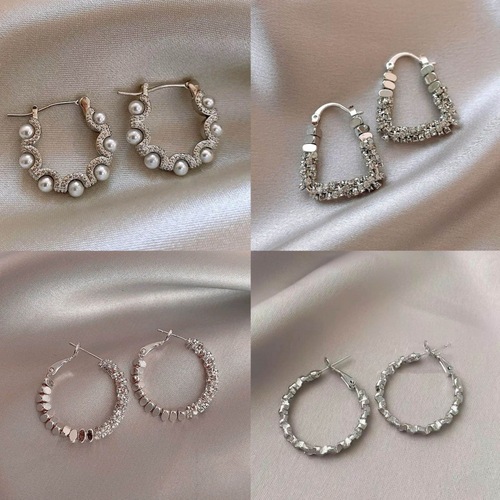 Geometric silver metal earrings for women, elegant and light luxury, unique design, high-end feel, cold-style earrings and earring accessories