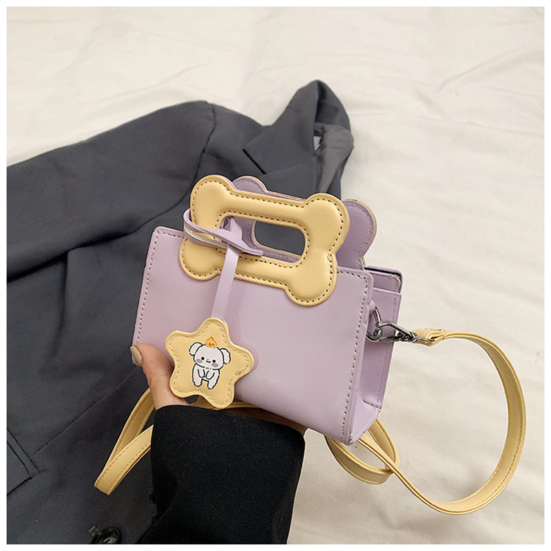 2025 primavera y verano estilo caliente moda casual niños dulces bolsa de gelatina mini bolso de mensajero de un solo hombro variedad al por mayor