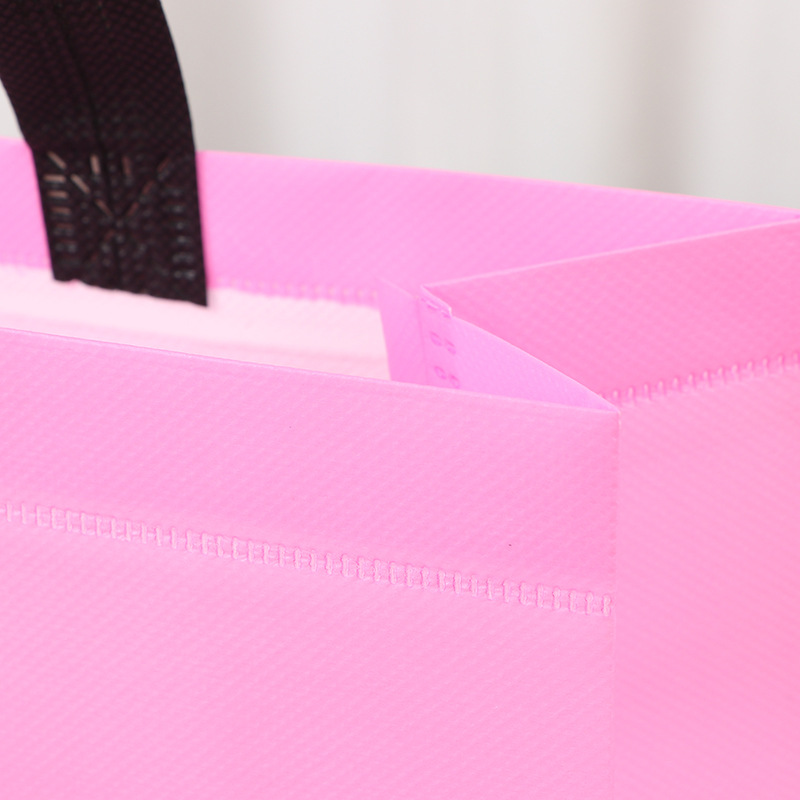 Bolsa de mano no tejida de color spot bolsas de compras de mano en blanco engrosadas logotipo publicitario impresas bolsas no tejidas image 4