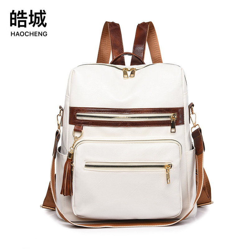 2022 verano nuevo estilo coreano damas de cuero suave mochila de moda borla viaje al aire libre mochila escolar