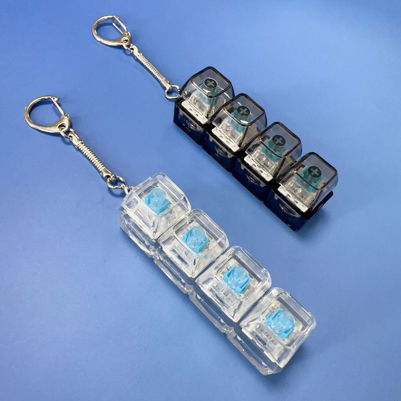 跨境4键减压按键机械轴解压玩具创意按键发光电子键盘钥匙扣挂件|undefined