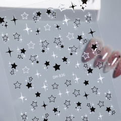 透かし彫り五角星ネイルシールの装飾品のバックゴムはシンプルで、輝く星芒爪シールの装飾品DH836