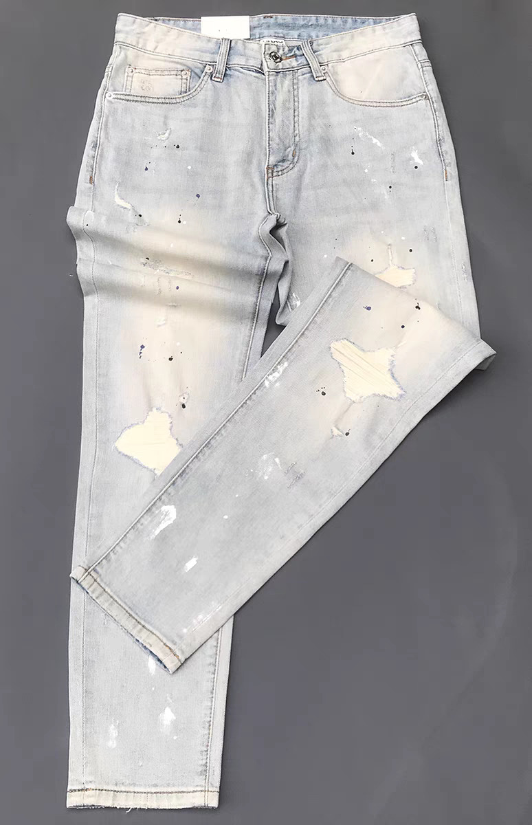 Jeans uomo slim fit elasticizzati con strappi e patch casual_voghion.com